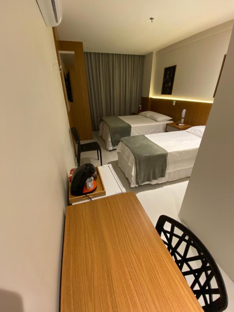 Suite Tripla Hotel America 캄푸스 두스 고이타카지스 객실 사진